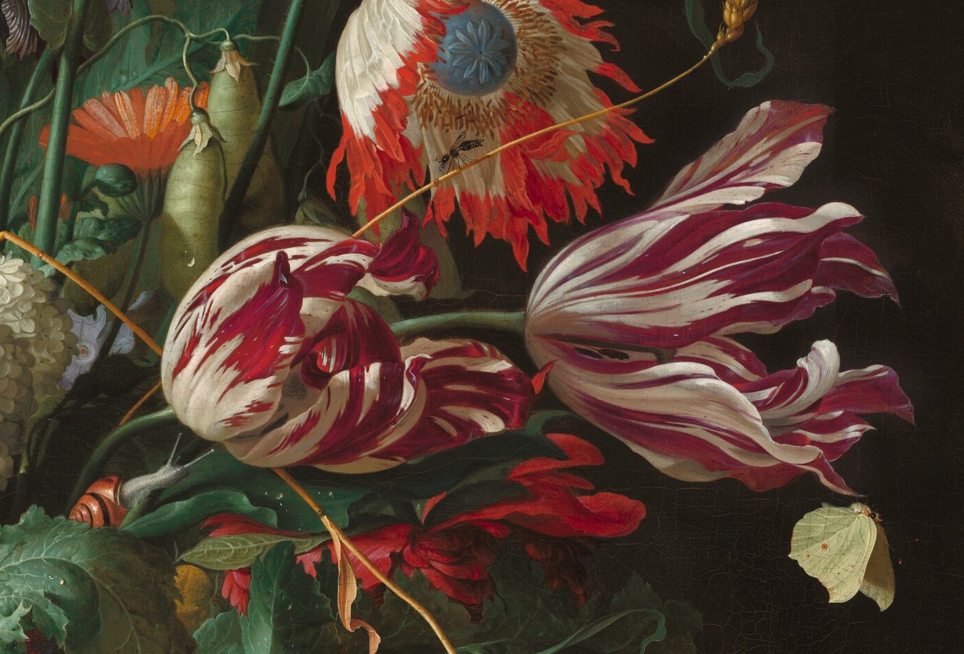 This vibrant bouquet shows flowers that bloom at different times.