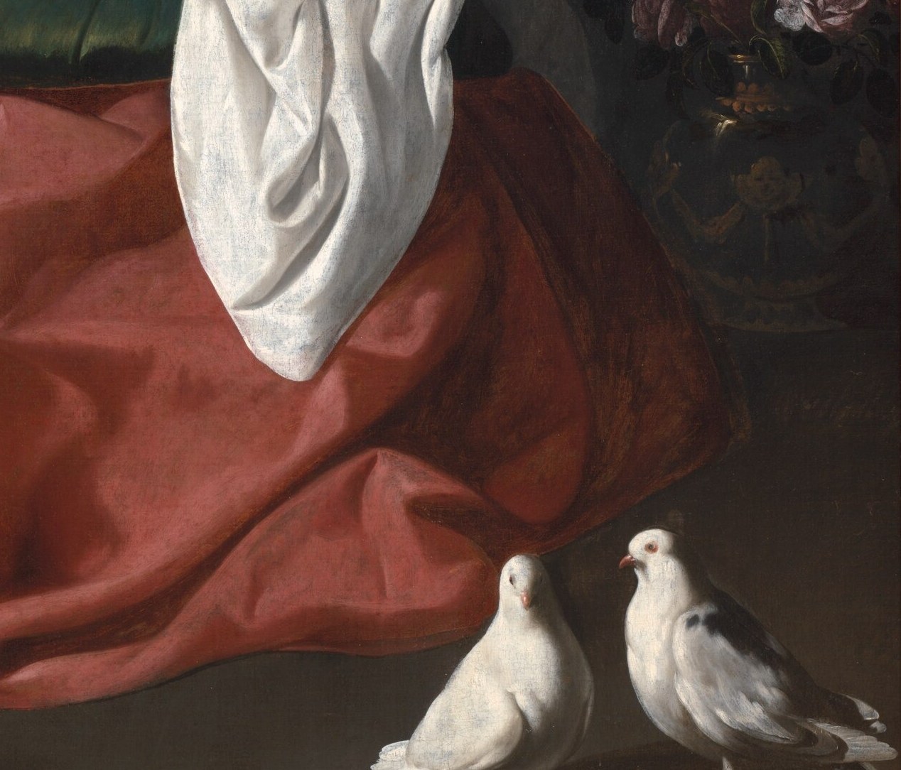 The doves on the floor represent the human soul, whose resurrection all this will secure.