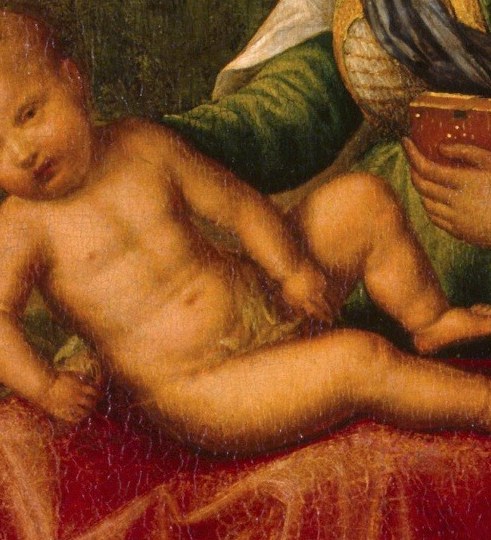 His relaxed, sleepy pose suggests innocence and vulnerability, a common depiction of the infant Jesus.