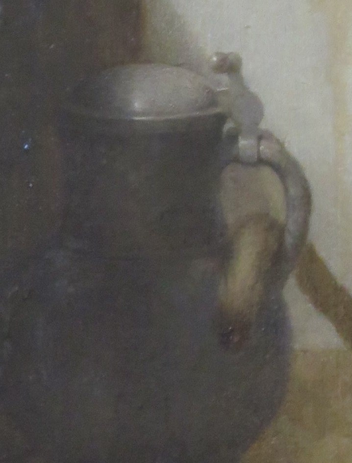 Its heavy form and dark color anchor the composition, hinting at utility and the passage of time through its worn appearance.