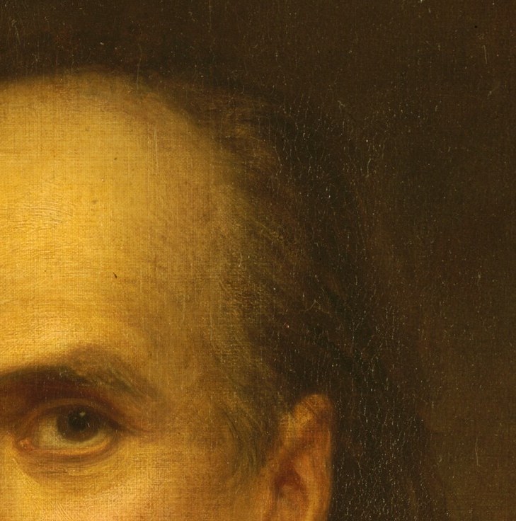 Slightly shadowed compared to its counterpart, hinting at three-quarter lighting and giving the face depth and sculptural relief.