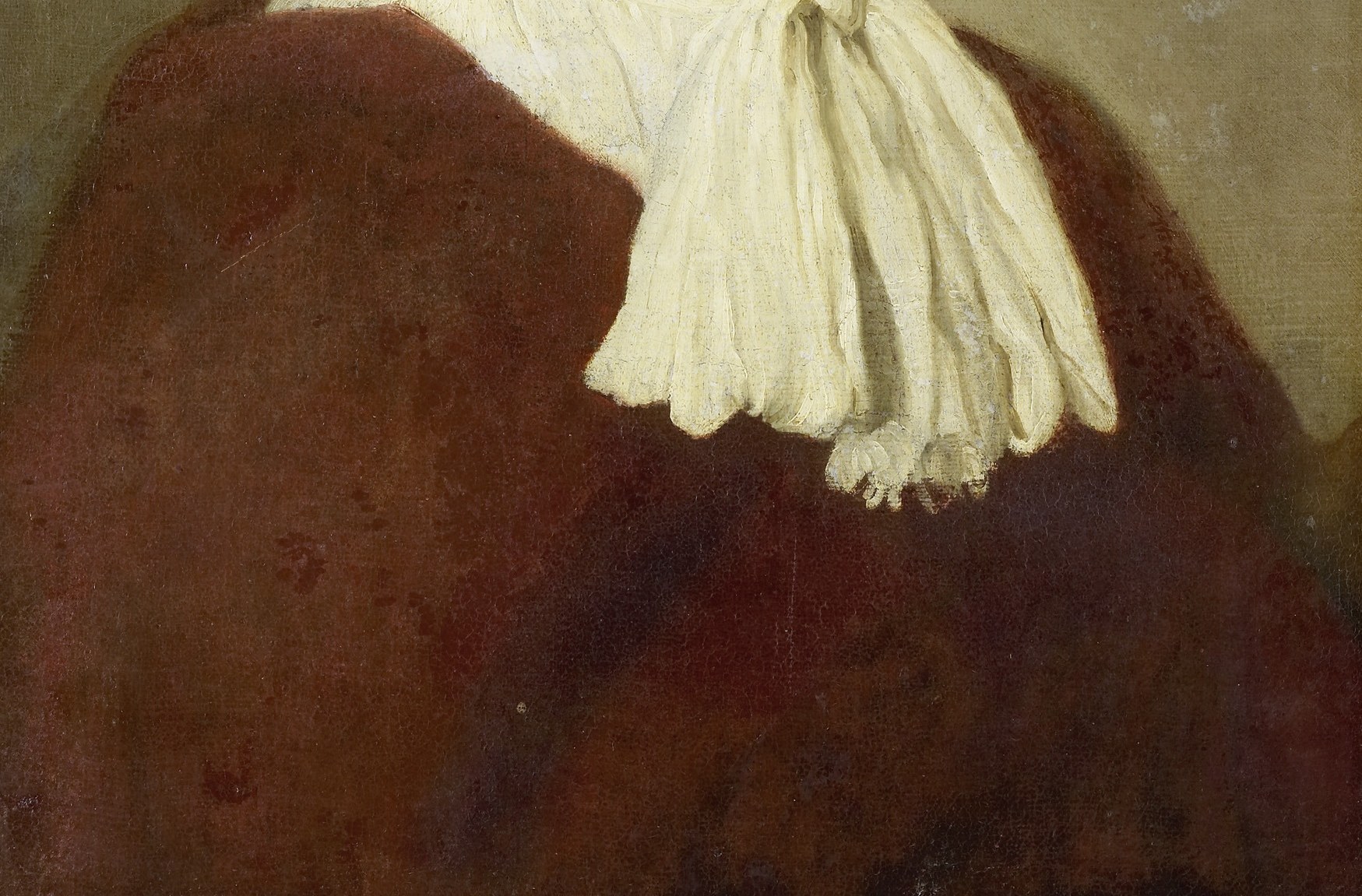 The rich, dark red of the garment provides a strong visual anchor and suggests the sitter's status.