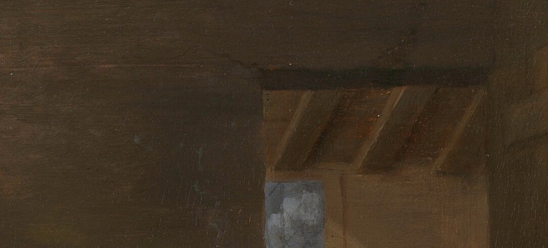 Look closely at the rough texture of the wooden ceiling beam.