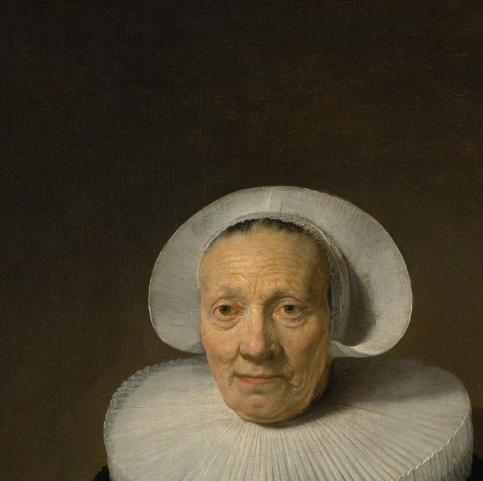 The weathered, softly lit face is the emotional core , aged skin, calm expression, and slightly downcast gaze convey a lifetime of quiet endurance.