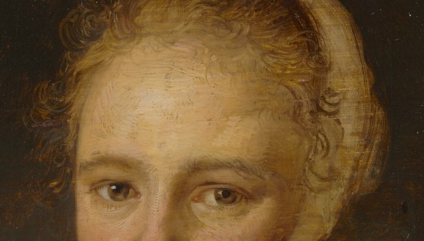 Her soft hair has finely rendered curls.