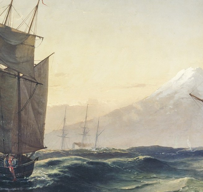 The smaller ship's sails are full of wind.