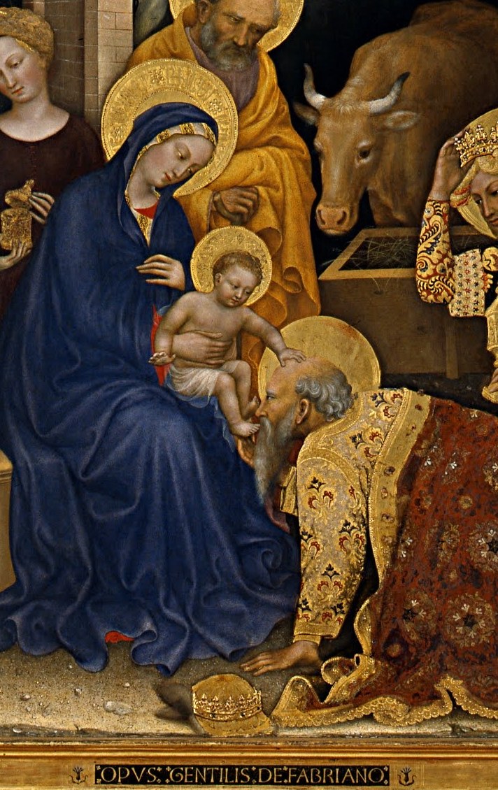 Her serene expression and posture convey maternal tenderness and humility.