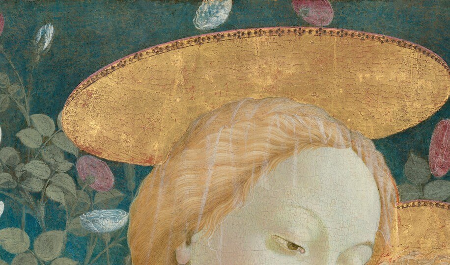 The flat gold disc, typical of early-Renaissance tempera convention, frames her face against the flowering garden and asserts divine status before doctrine can speak.