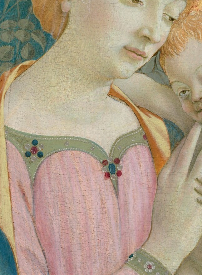 Warm rose-pink is unusual for Marian iconography; Venetian painters favored it as a humanizing counterpoint to the traditional blue, pulling the Virgin toward earthly warmth.