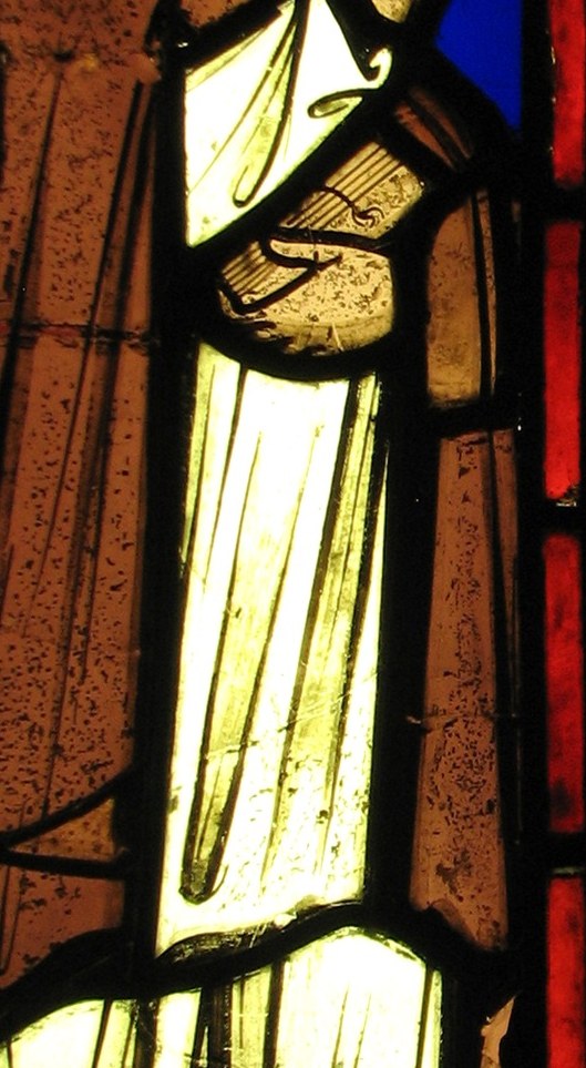 St. Martin's white cloth recalls the cloak he shared with a beggar.