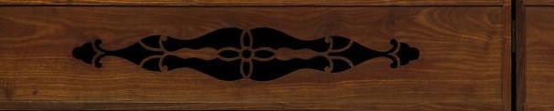 The dark, carved wood provides a grounding element and a contrast to the delicate painting above.