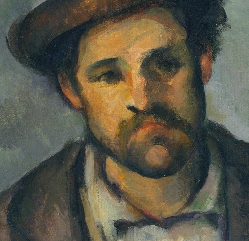 His face suggests a life of labor, hard-won and quiet.