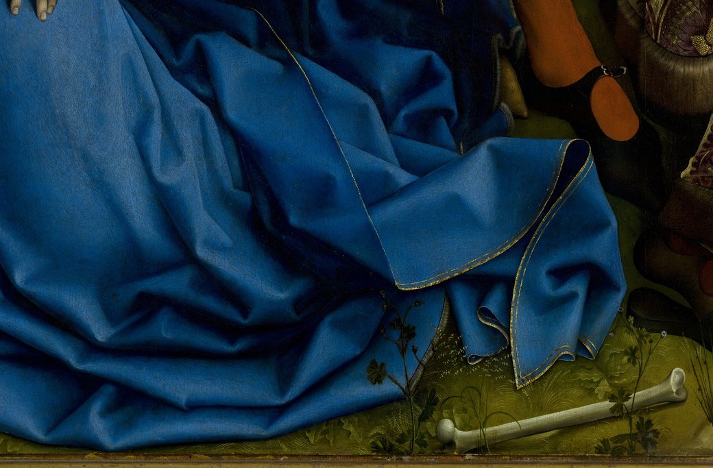 Now look at the foot of the cross. The shadows hold something.