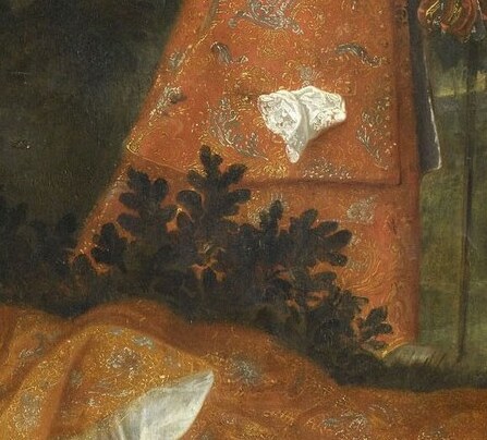 The red dress has patterned fabric.