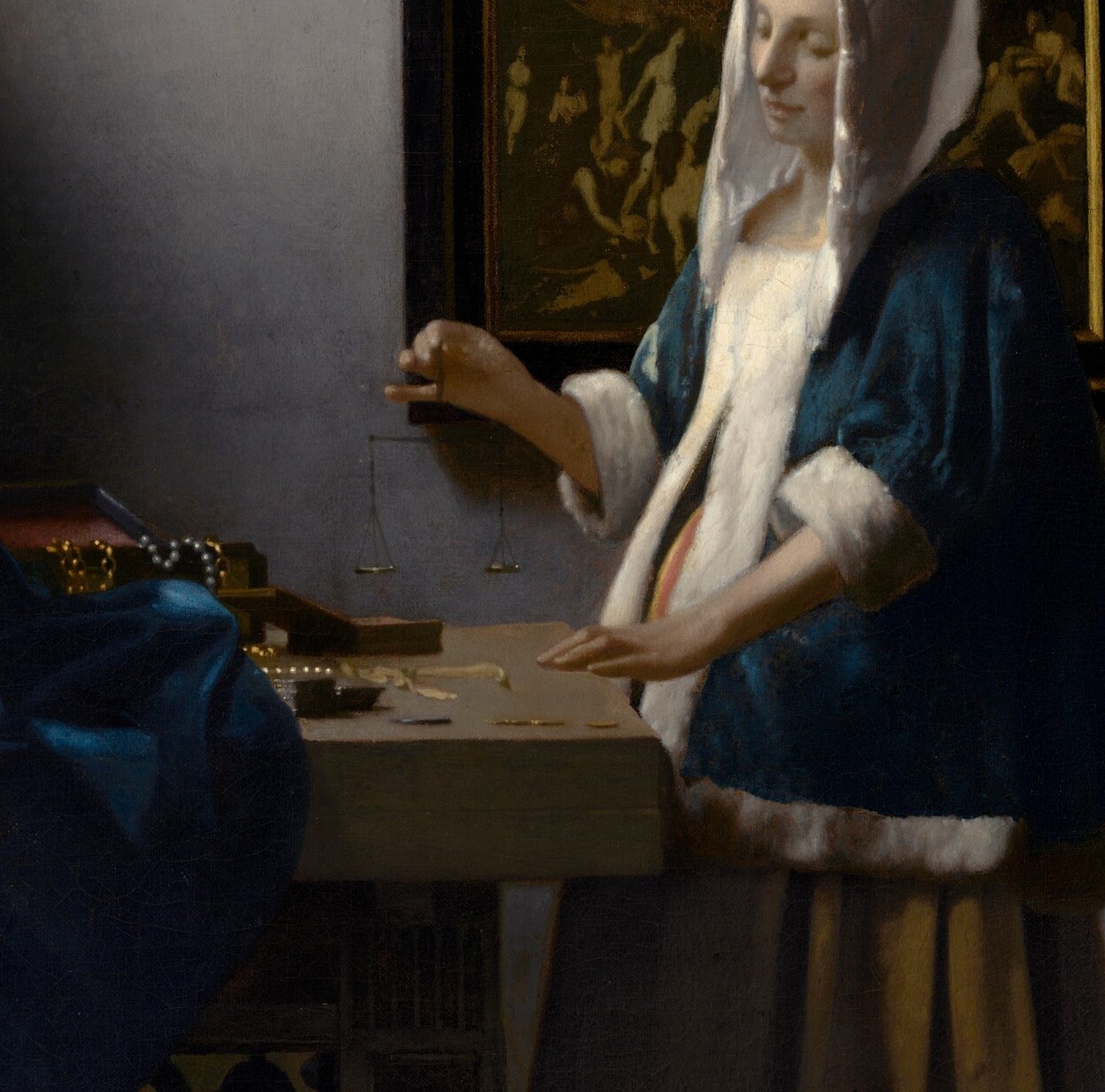 ermine signals worldly wealth , ironic beside spiritual scales; Vermeer recycled this exact garment across multiple works
