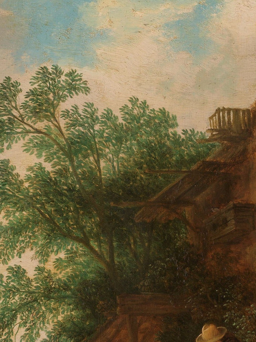Provides a natural element and frames the scene, contrasting with the man-made structures.