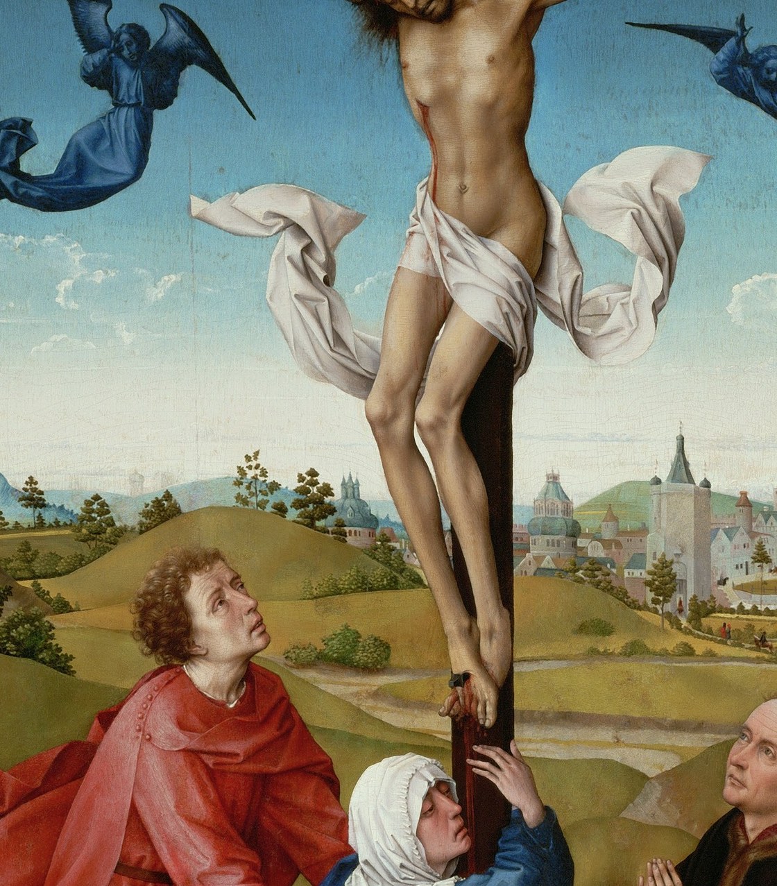 The central, emaciated figure, conveying immense suffering and sacrifice.