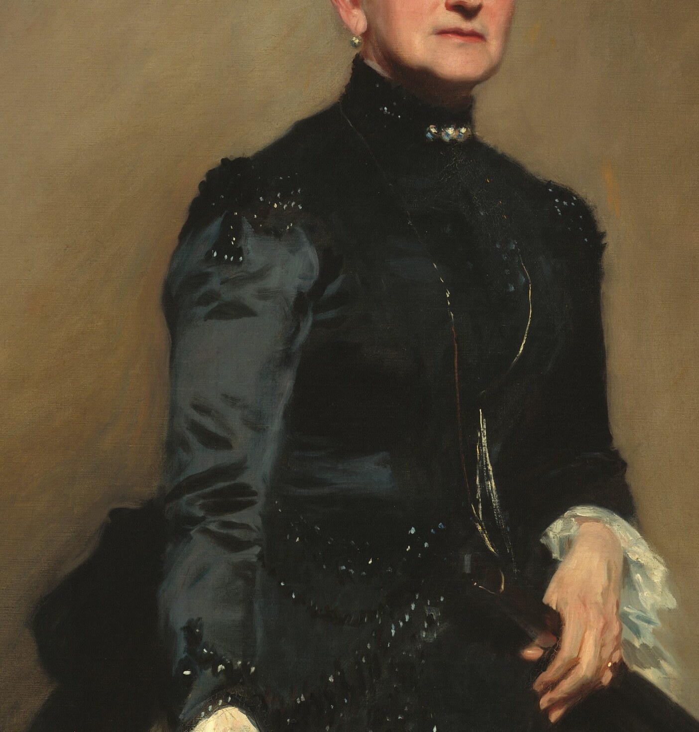 Her black silk dress, with its sweeping form, dominates the canvas.