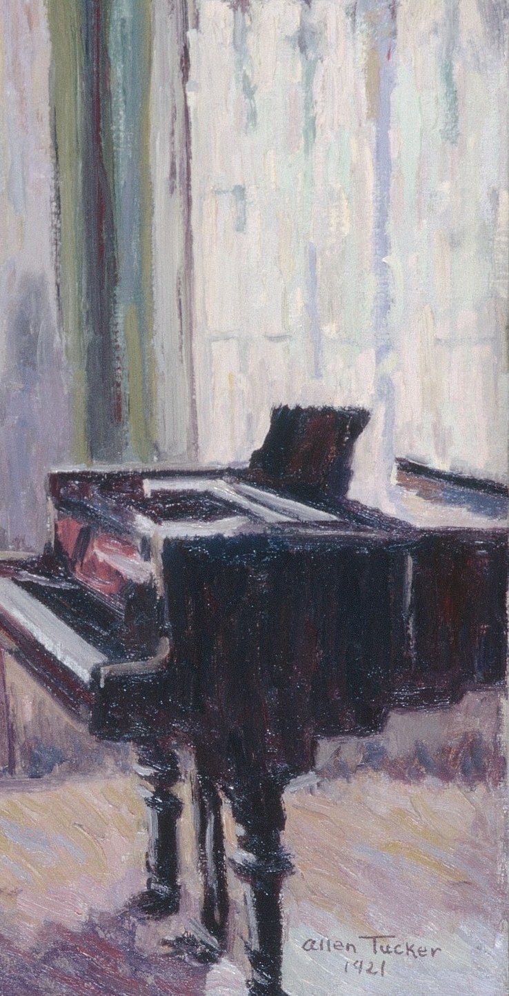 The grand piano fills the right half of the room, massive and silent.