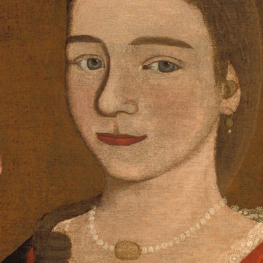 Her gentle smile and direct gaze convey a sense of quiet confidence and inner life.