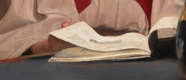 The book is open, pages slightly rumpled.