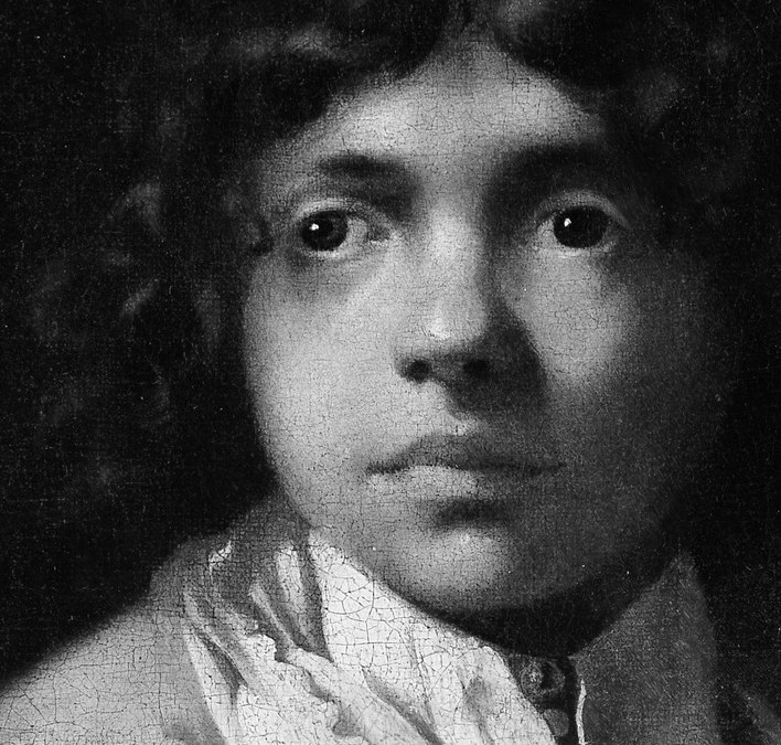 This young man gazes out, simply and directly.