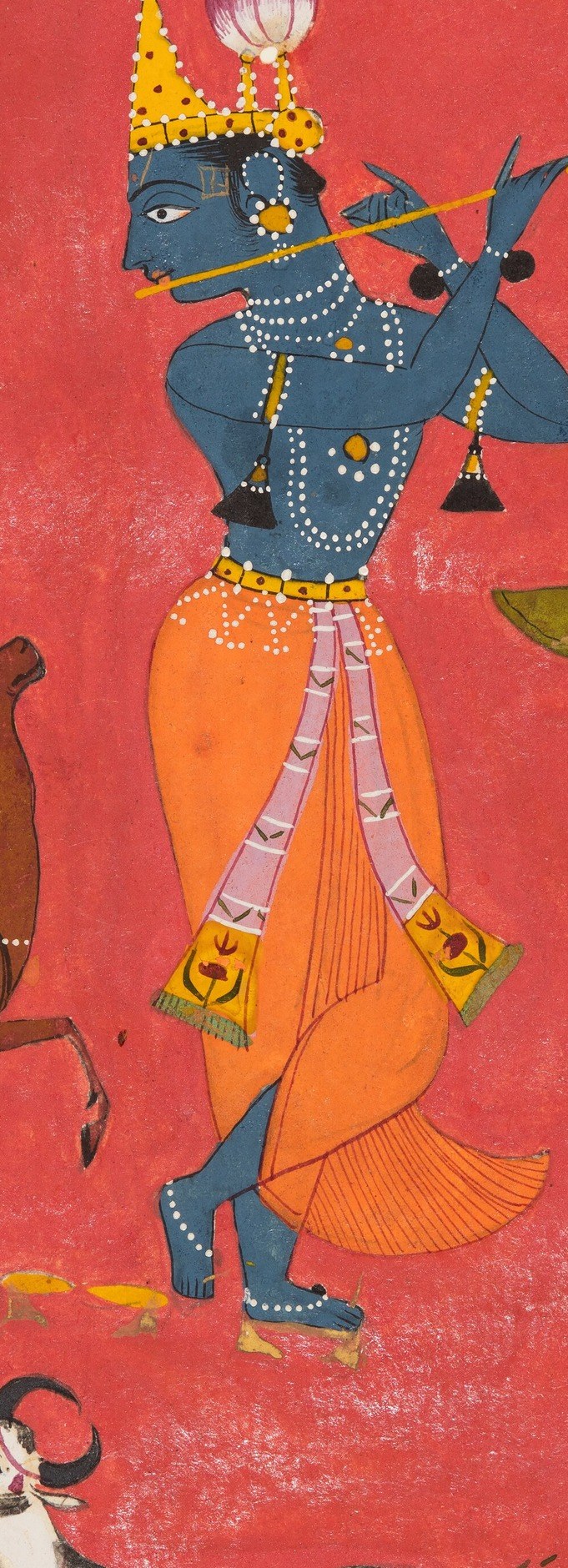 His blue skin and jeweled crown are signs of his divinity.