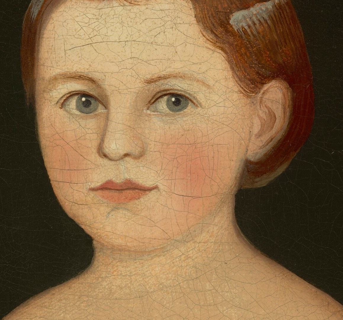 Her direct gaze and soft features convey a sense of youthful innocence and introspection.