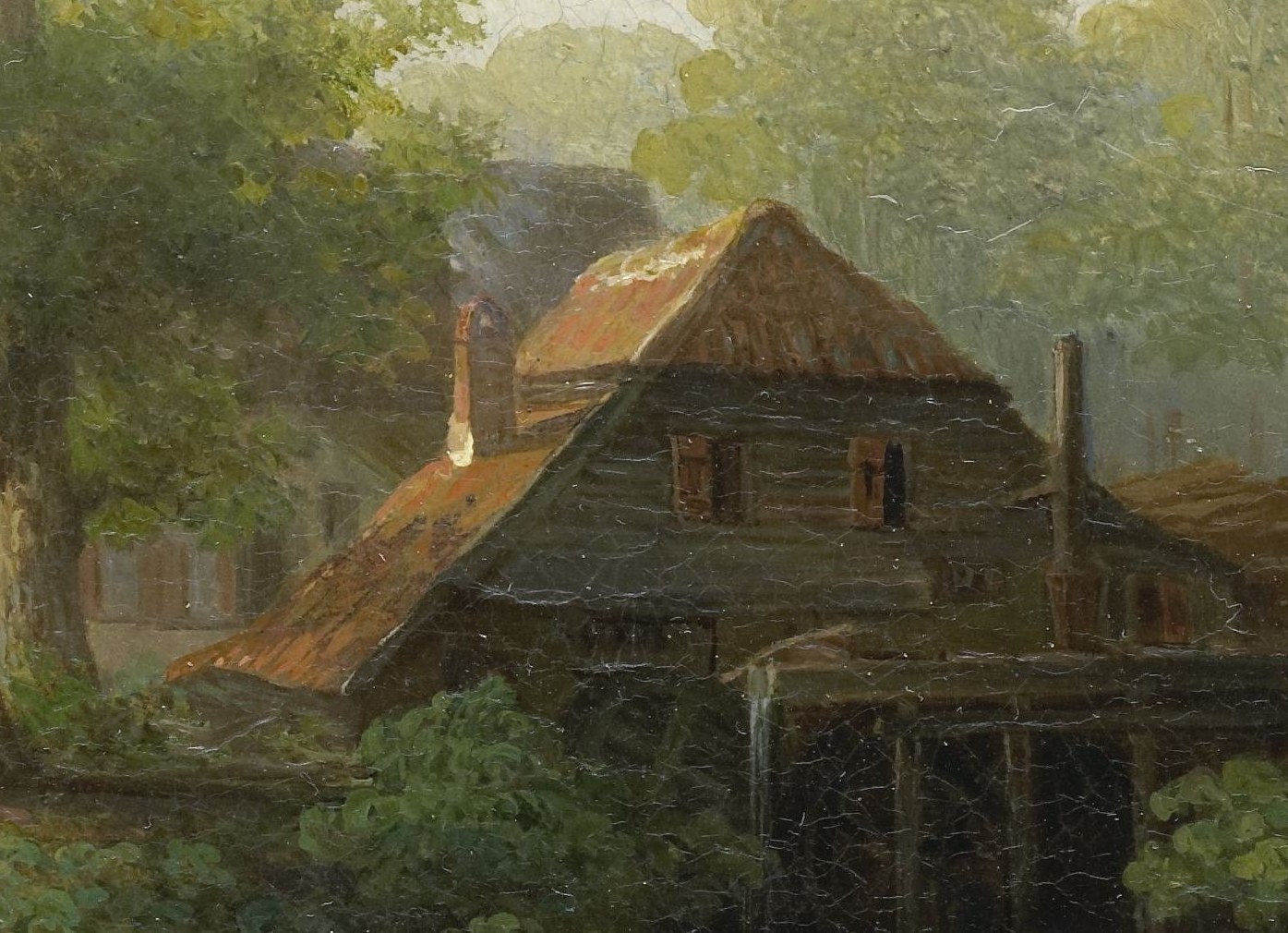 The rustic architecture and the warm roof color suggest a working building integrated into the natural landscape.