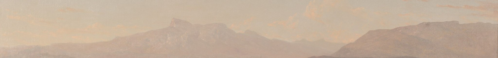 The haze between valley and peak dissolves distance into pure atmosphere.