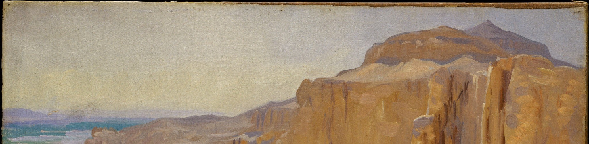 The subtle shift in color from pale yellow to a soft blue suggests the time of day and the dry, clear atmosphere.