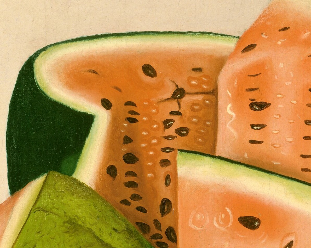 Its angled cut and exposed seeds offer a different perspective on the fruit's internal structure and texture.