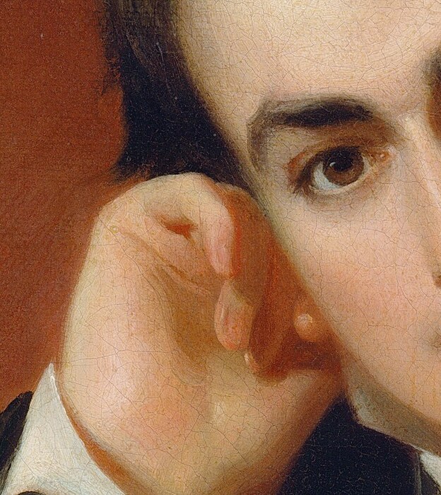 His pose, with his hand on his chin, suggests deep contemplation.