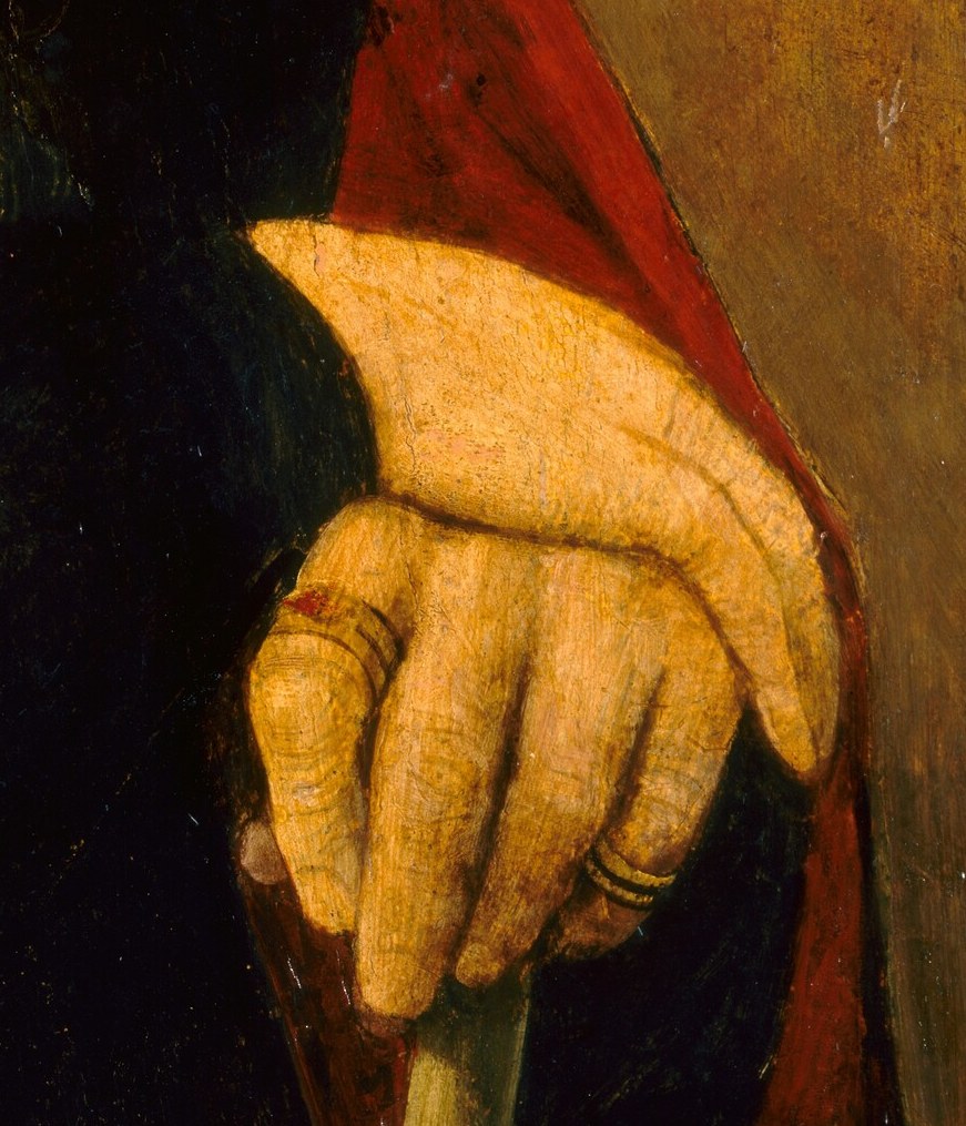 The detailed rendering of the hand, including rings, shows the artist's skill and emphasizes wealth.