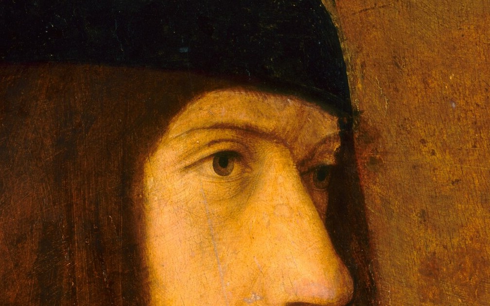 The soft texture of the velvet contrasts with the sharp lines of the face, indicating the sitter's status.