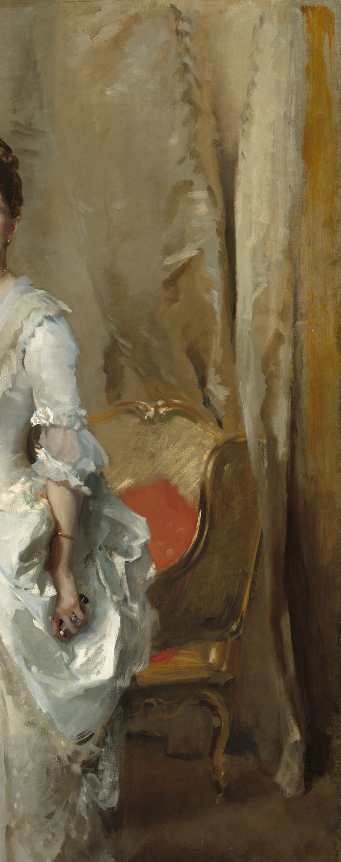 The warm ivory backdrop unifies the palette but is not flat , soft folds and a golden warmth suggest theatrical staging, placing the sitter in an ambiguous domestic-ceremonial space.