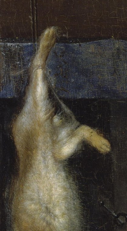 A rabbit hangs nearby, waiting.
