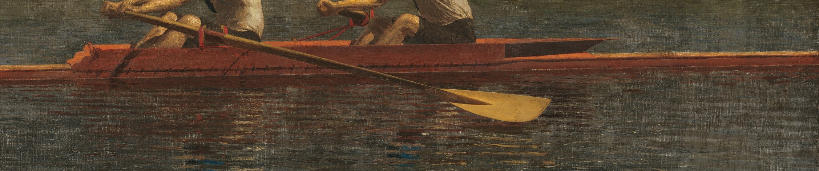 The sleek, red hull emphasizes speed and the competitive nature of the scene.