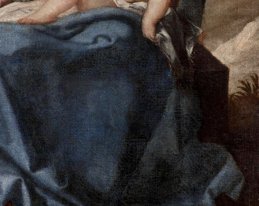 Beneath her, the rocky outcrop is also symbolic.