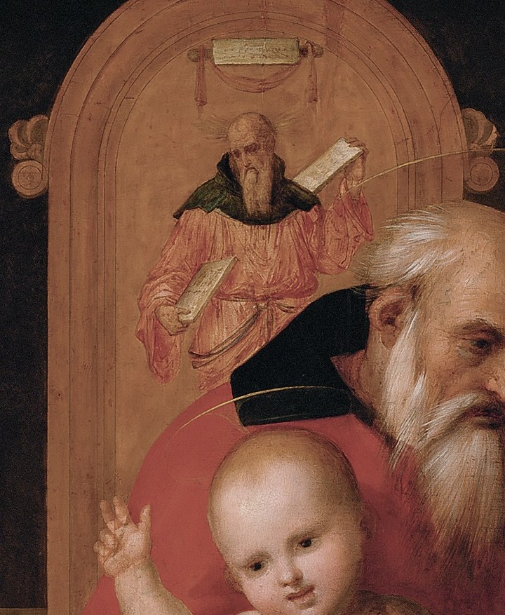 Look closely at the altarpiece behind the figures.