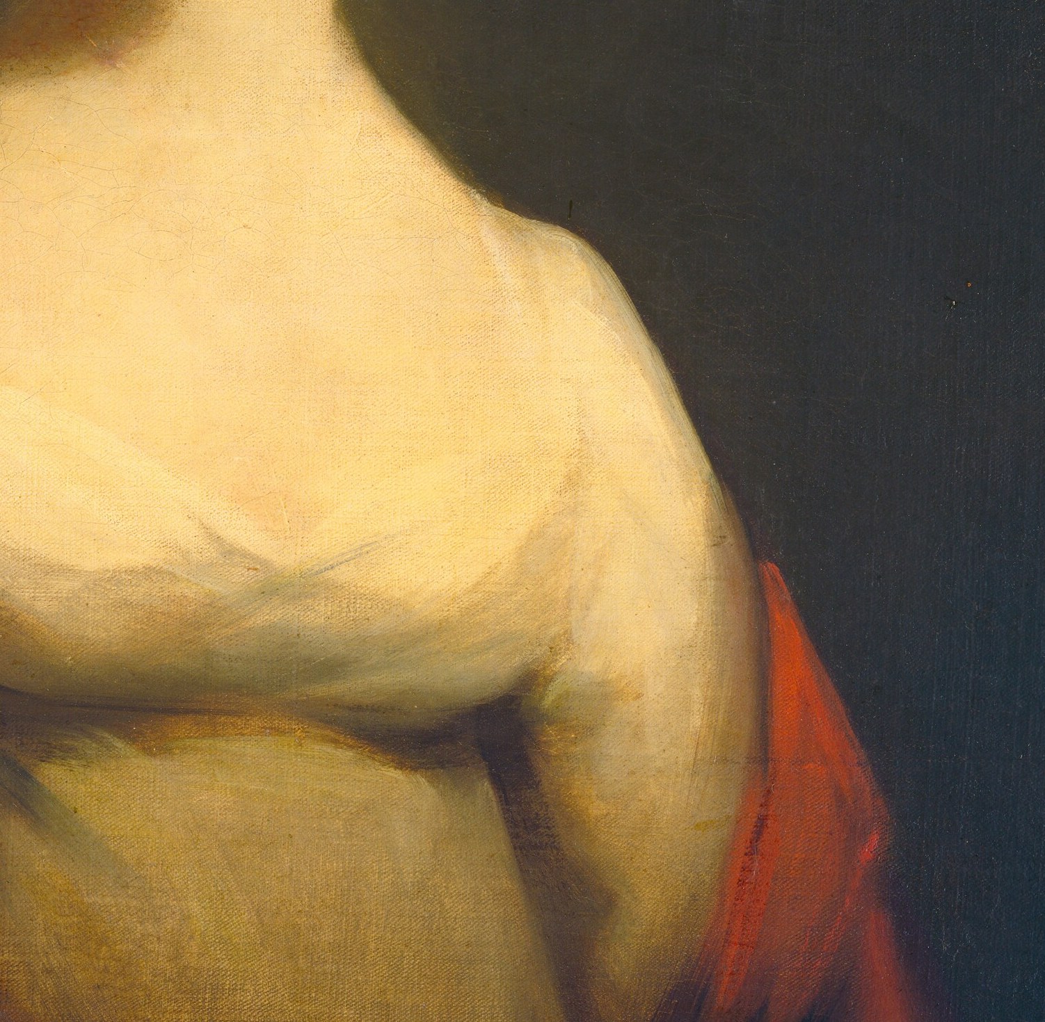 He captures the delicate texture of her white gown.