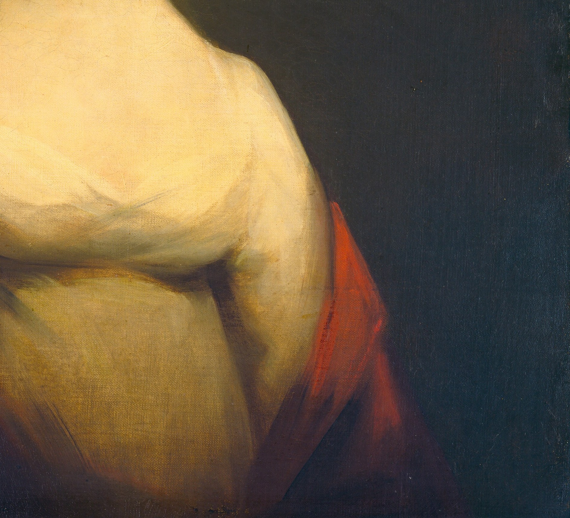 But look closely at the vibrant red shawl.