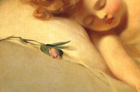 A pink rosebud rests beside her, barely opened.