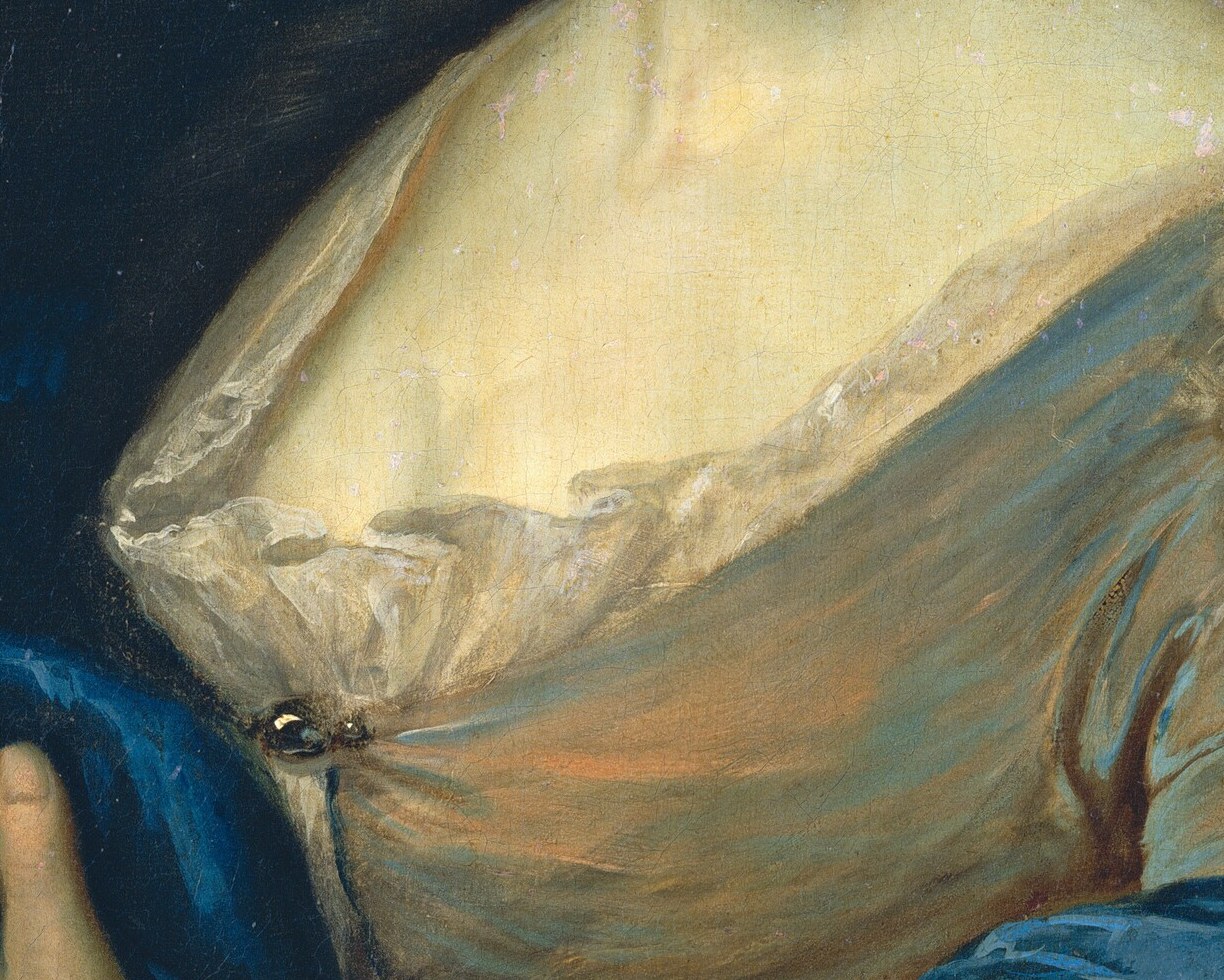 But the real trick is the white lace of her gown.