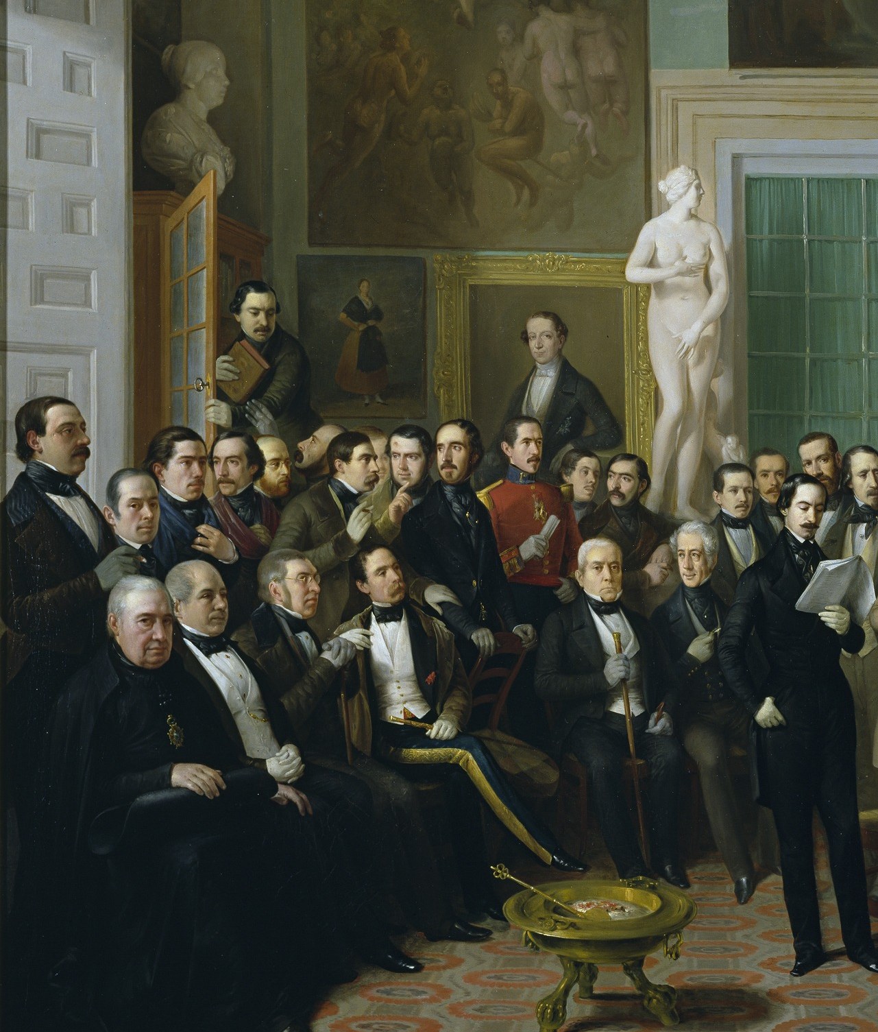 Named identifiable portraits of Spain's leading intellectuals , faces turned toward the reader with varying degrees of attention; recoverable from contemporary engravings, this is historical documentation masquerading as genre painting