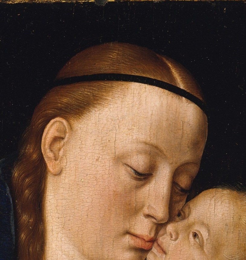 Her eyes are closed. Her lips are barely parted.