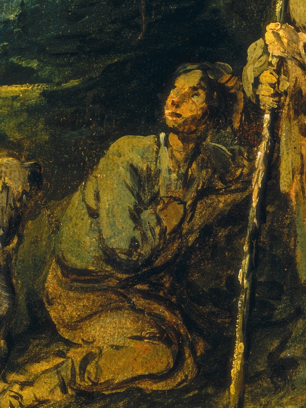 His posture suggests weariness and a need for rest, emphasizing the harshness of their situation.