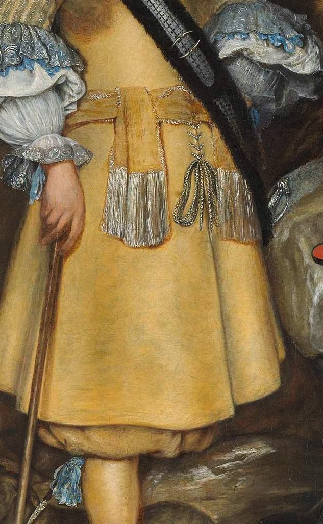 The rich, textured fabric and vibrant color draw the eye, highlighting his status and the painting's overall richness.