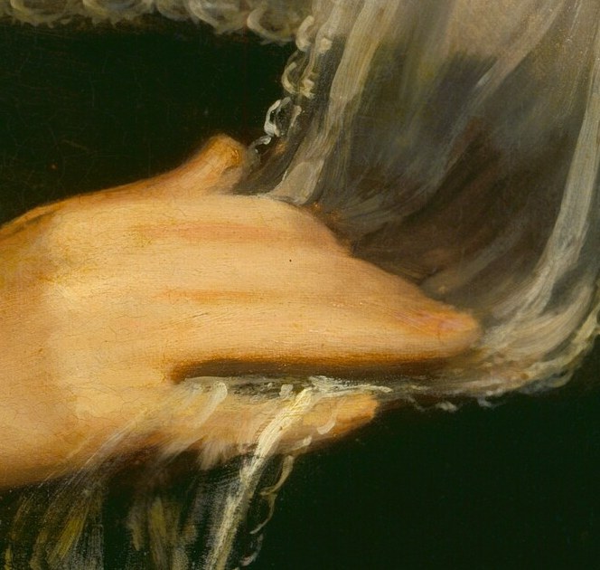 Her right hand, placed on her chest, indicates modesty.