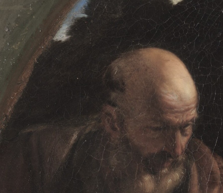 Saint Joseph looks old, his beard is rough.